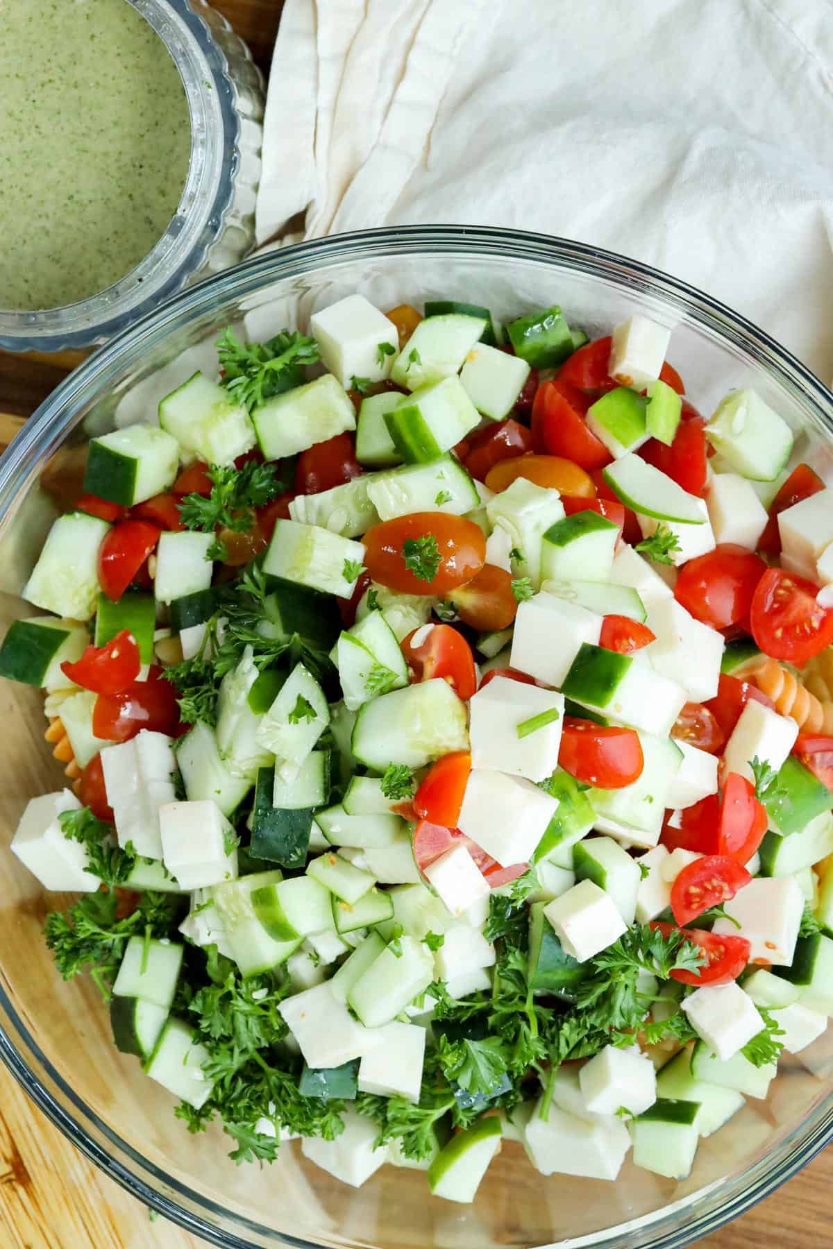 assembling pasta salad
