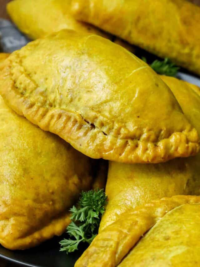 Jamaican Beef Patties Stacked on top of each other