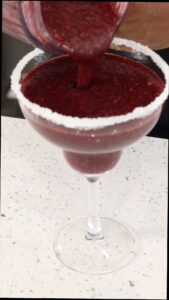 pouring Frozen Berry Margarita Recipe
