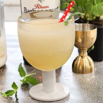 Haitian Jus Citron With Barbancourt garnished with mint leaves - Haitian Cocktail