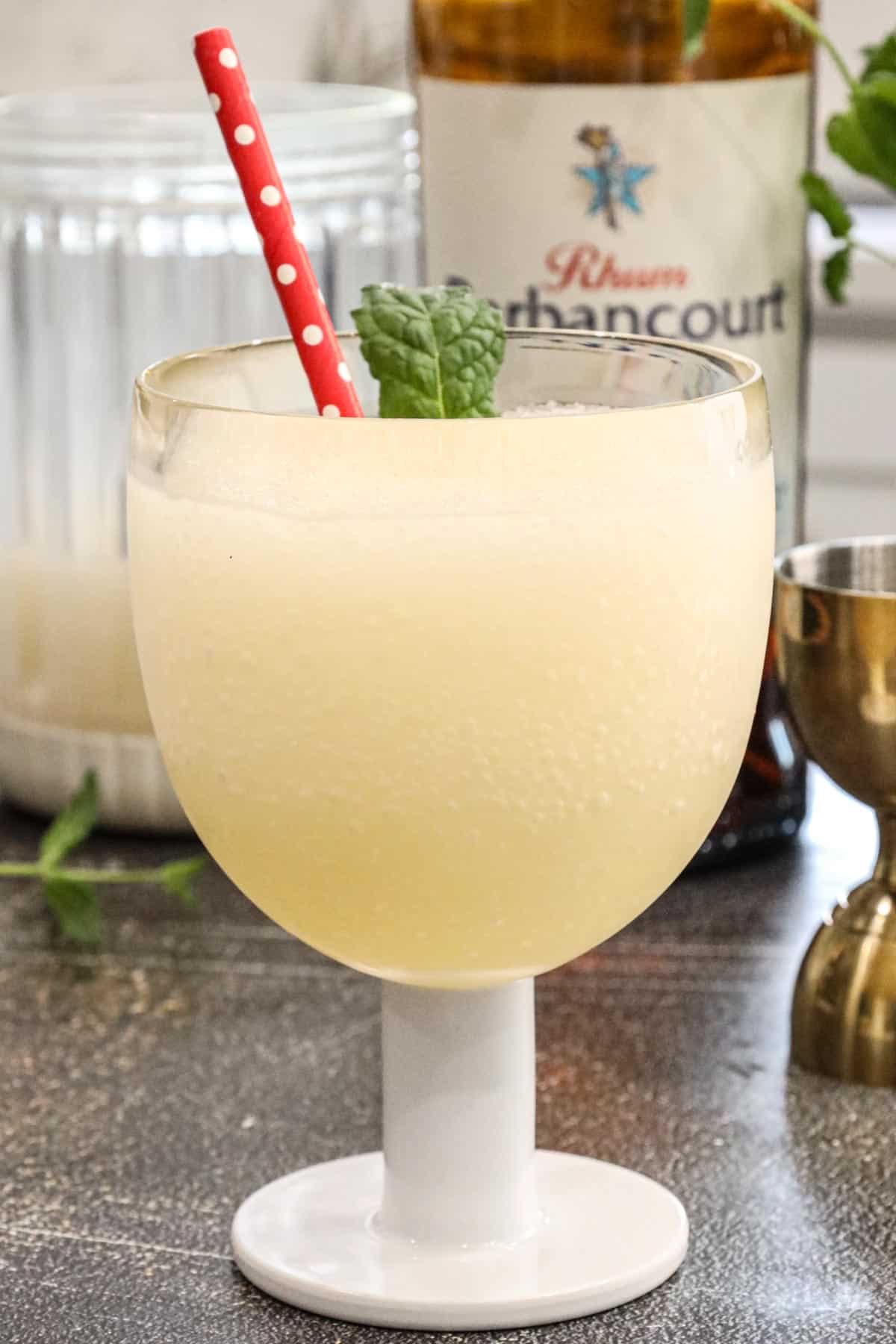 Haitian Jus Citron With Barbancourt garnished with mint leaves - Haitian Cocktail