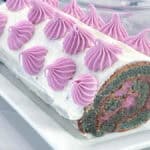 This Chameleon Ube Swiss Roll Cake started with purple ube batter before changing color in the oven.