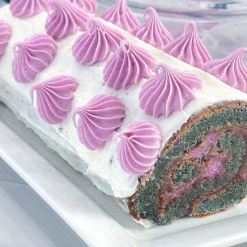 This Chameleon Ube Swiss Roll Cake started with purple ube batter before changing color in the oven.