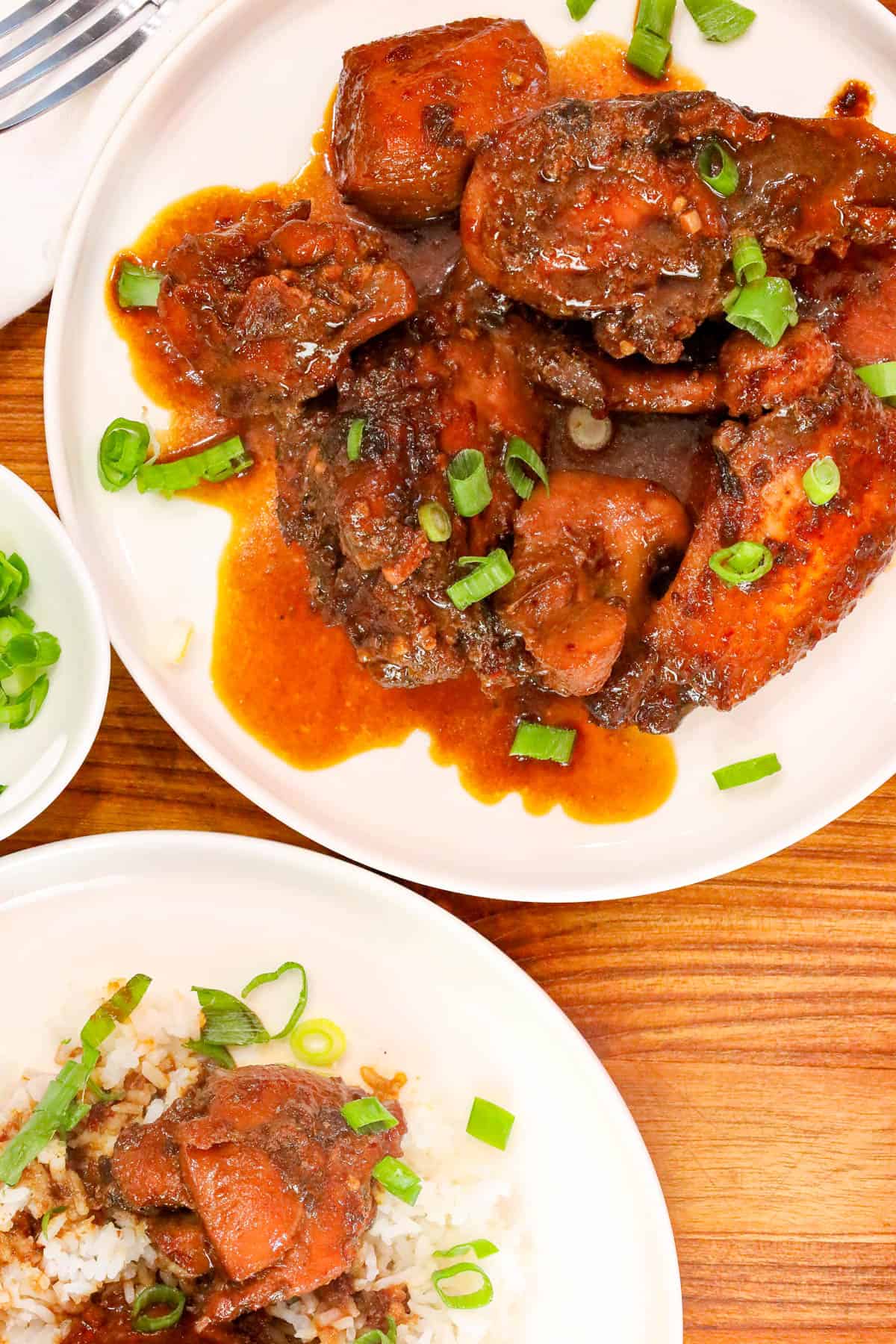 Close-up of tender Chicken Adobo coated in rich soy garlic sauce.