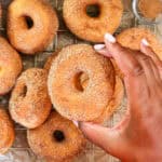 hand holding one donut