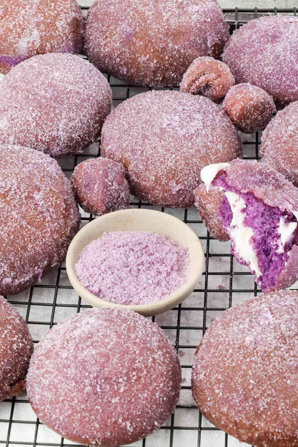 Dusted sugar Ube donuts with filled donuts