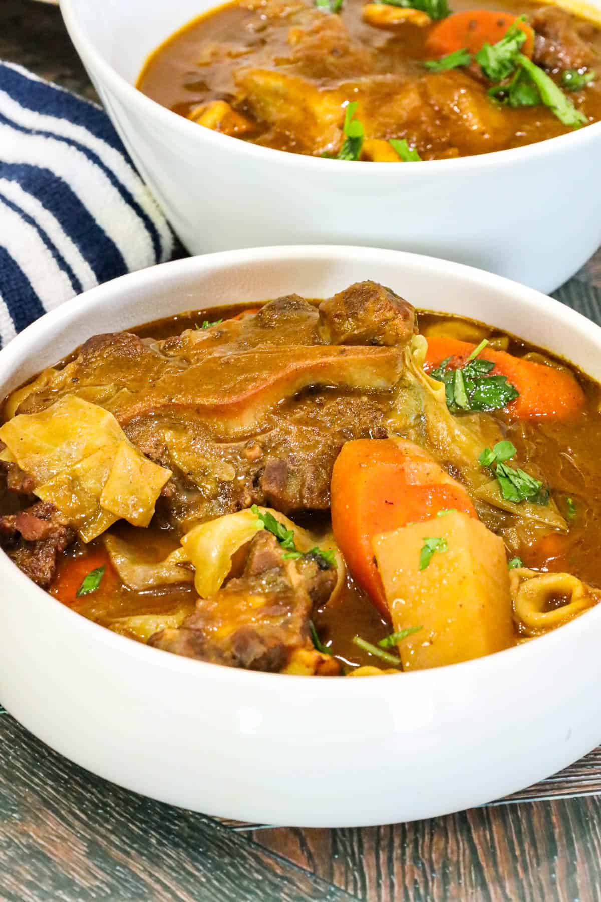Soup Joumou in white bowl
