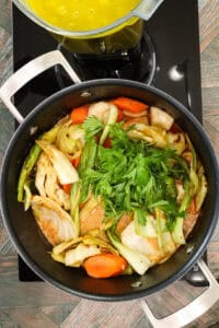 cooking veggies to oxtail soup