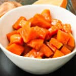 Southern Candied Yams in white bowl