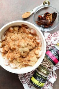 Bite-sized chicken breast pieces coated with Jacmel and Delmas seasoning blends and flour